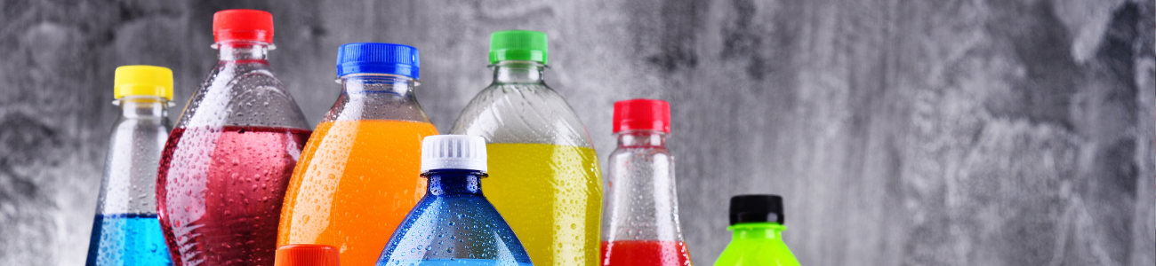 Soda bottling line with conveyors and carbonation equipment